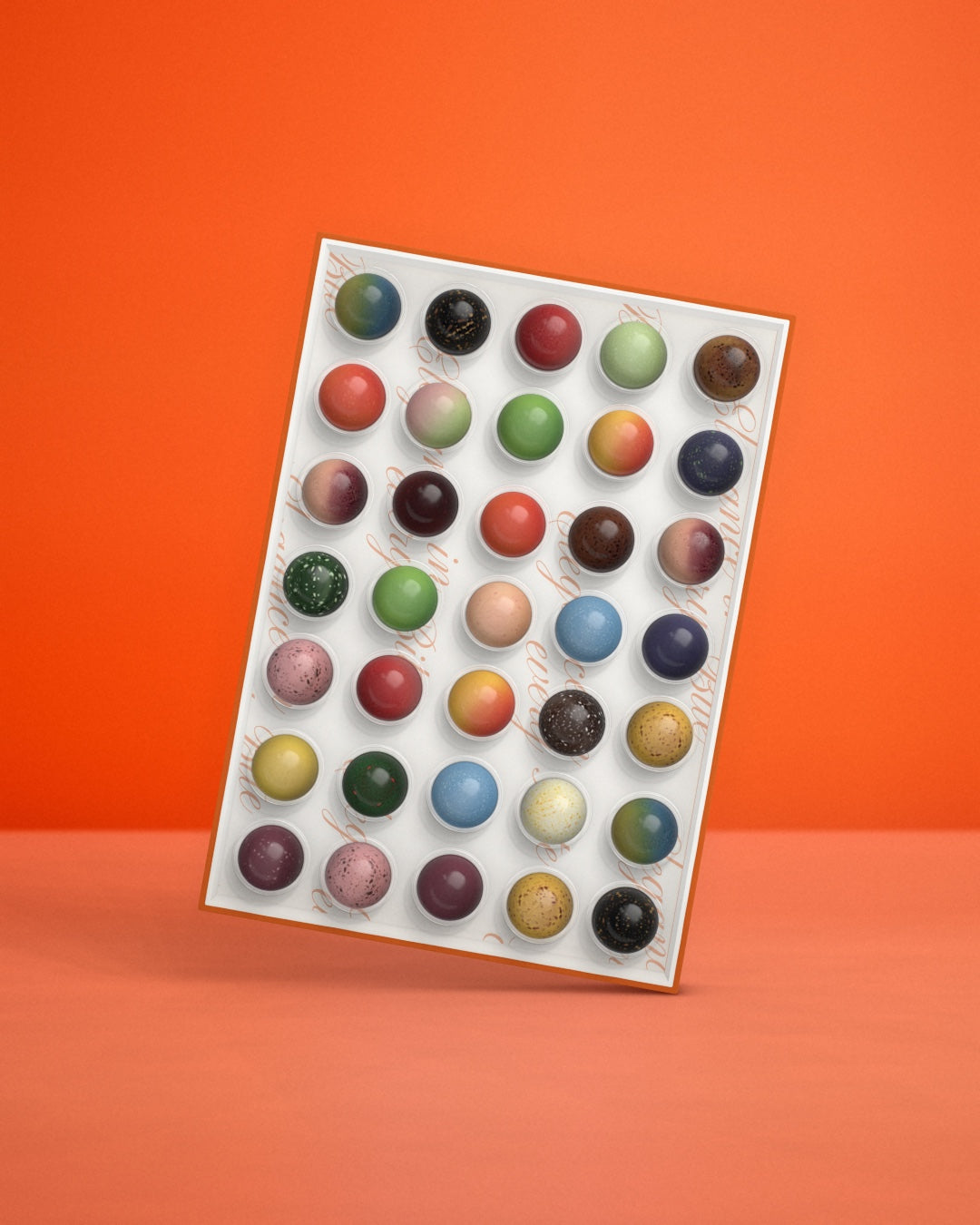 Open bonbonbox met 35 bonbons in verschillende smaken in heldere cupjes